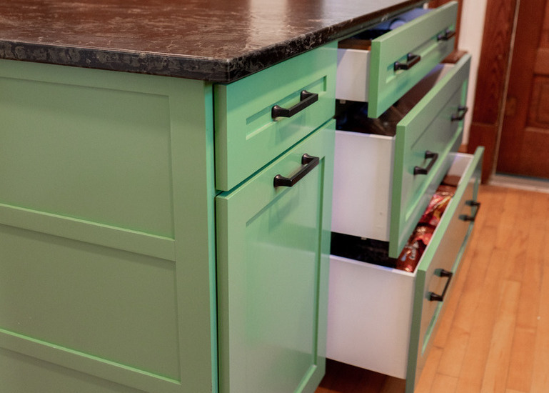 Kitchen island with custom cabinetry in Edina, MN by Raymond Family Enterprises