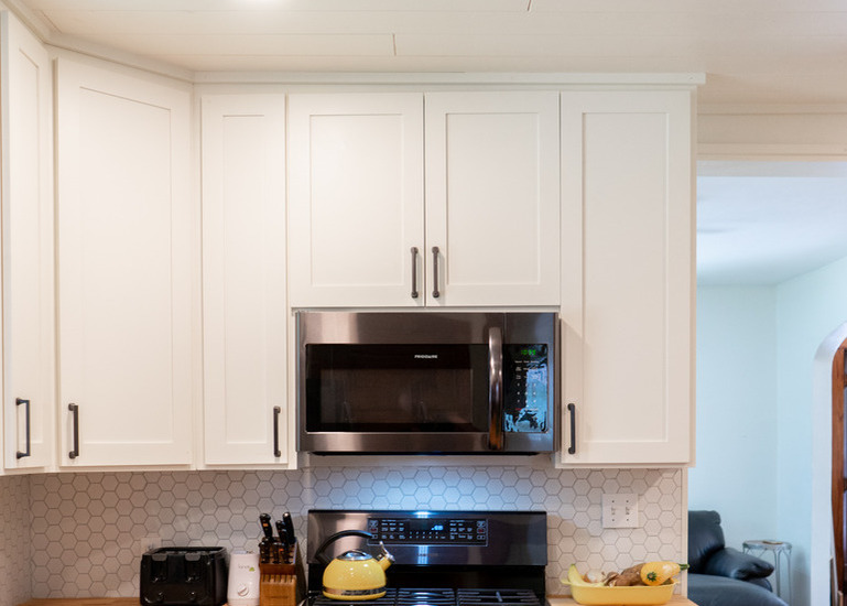 Custom upper kitchen cabinets built and installed by RFEMN in Monitcello, MN